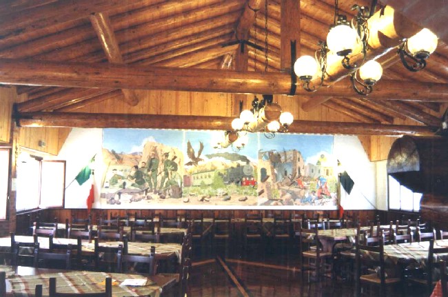 Immagine di parte dell'interno della baita alpina di Ceriano Laghetto